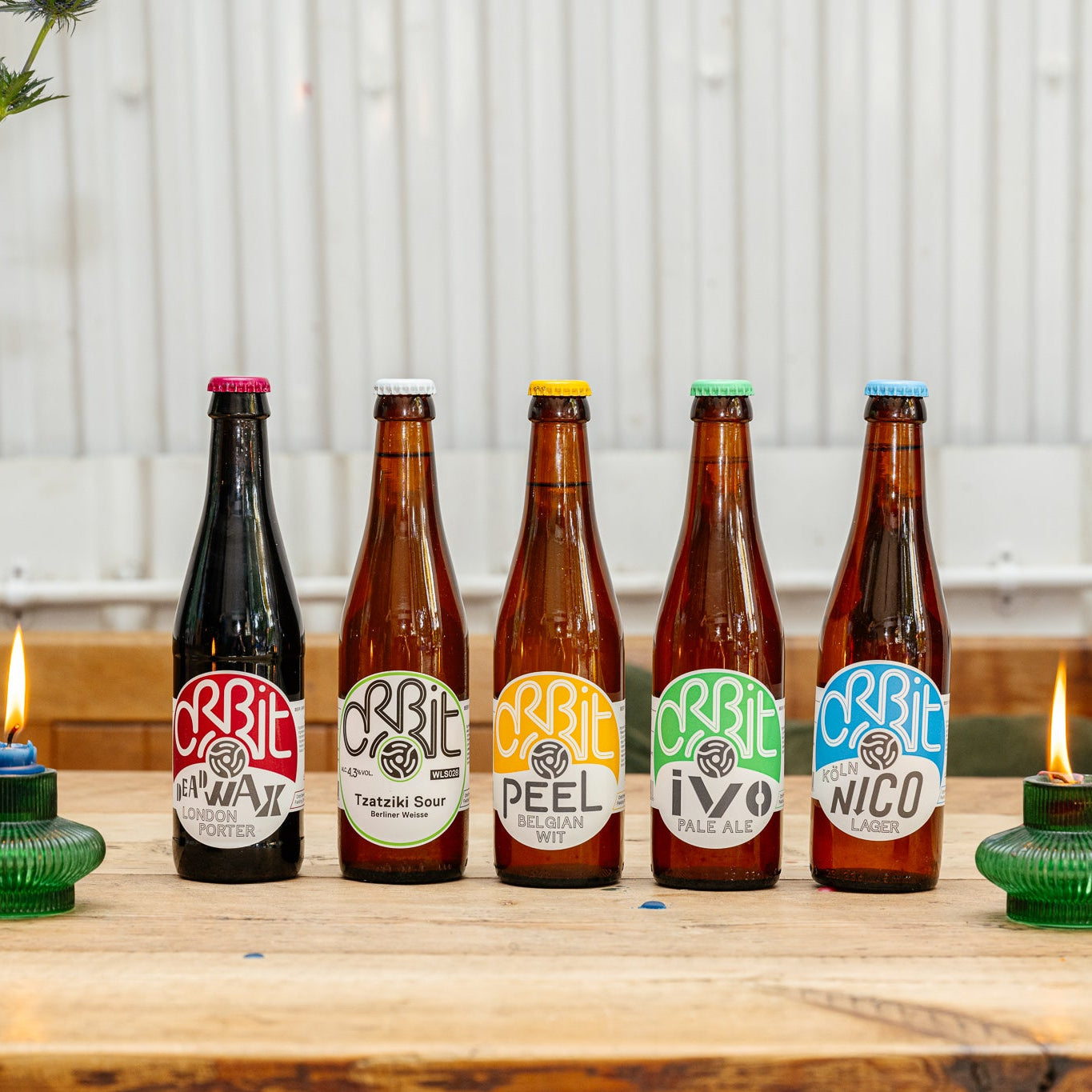 Orbit Beers bottle lineup including Dead Wax, Tzatziki Sour, Peel, Ivo and Nico, in a Brewser subscription box