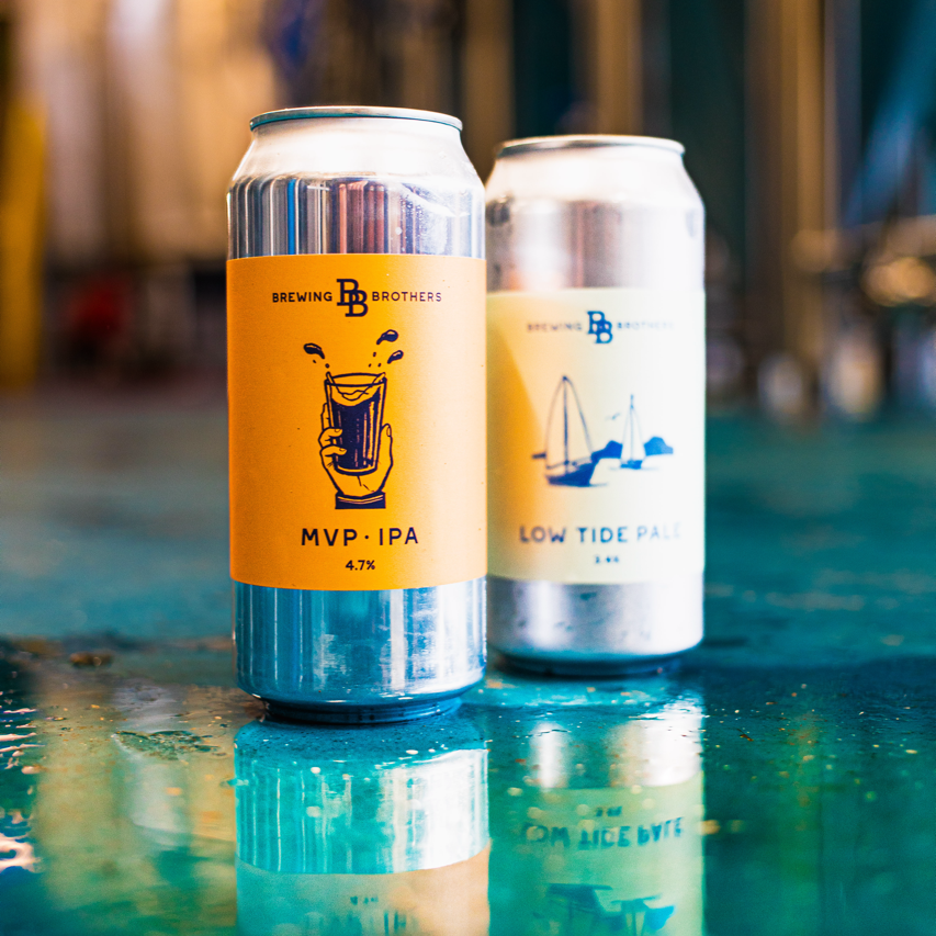 Brewing Brothers MVP IPA and Low Tide Pale cans on a reflective surface, Brewser craft beer subscription