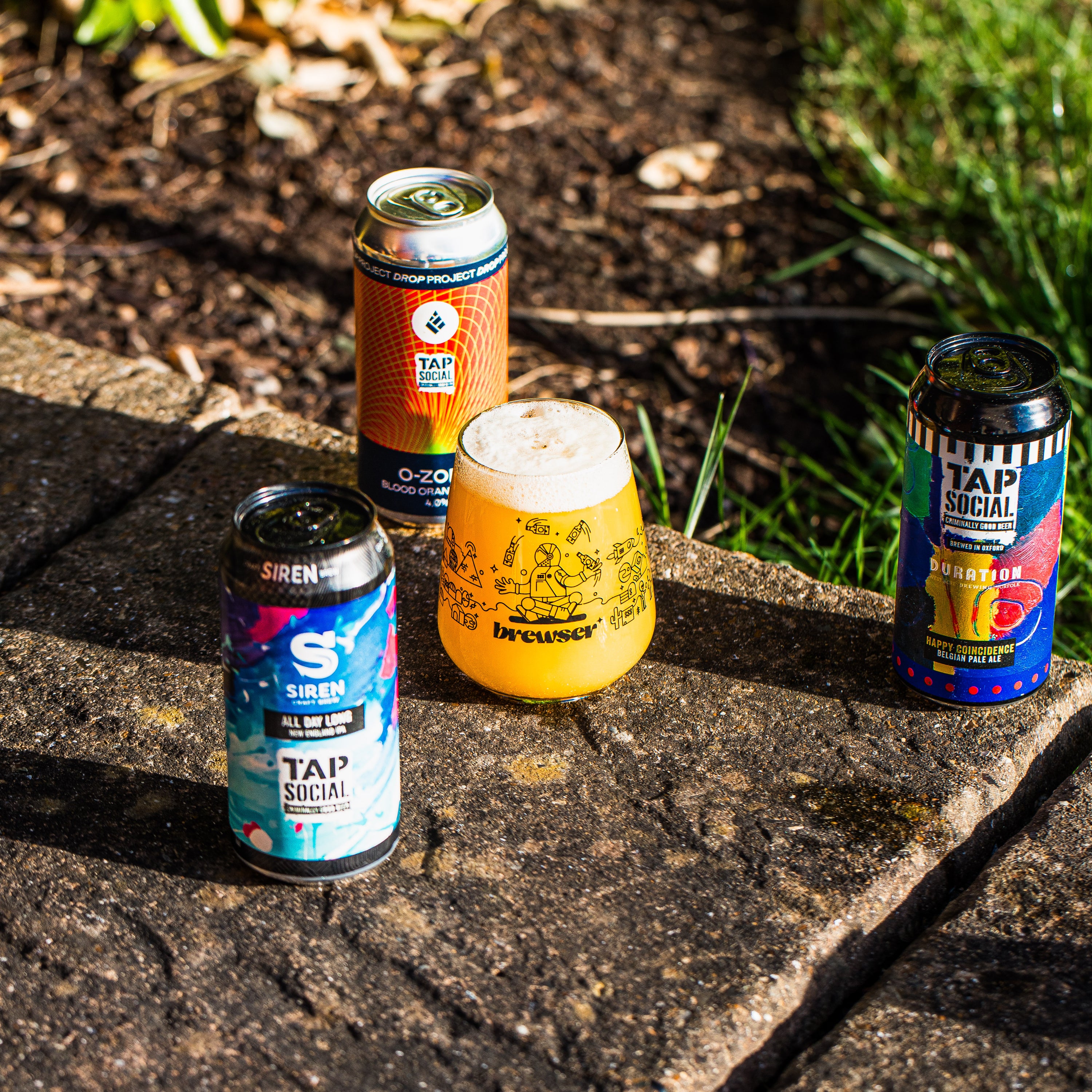 Tap Social Brewery mixed can lineup with Siren and Duration Brewery cans and Brewser glass, craft beer subscription

