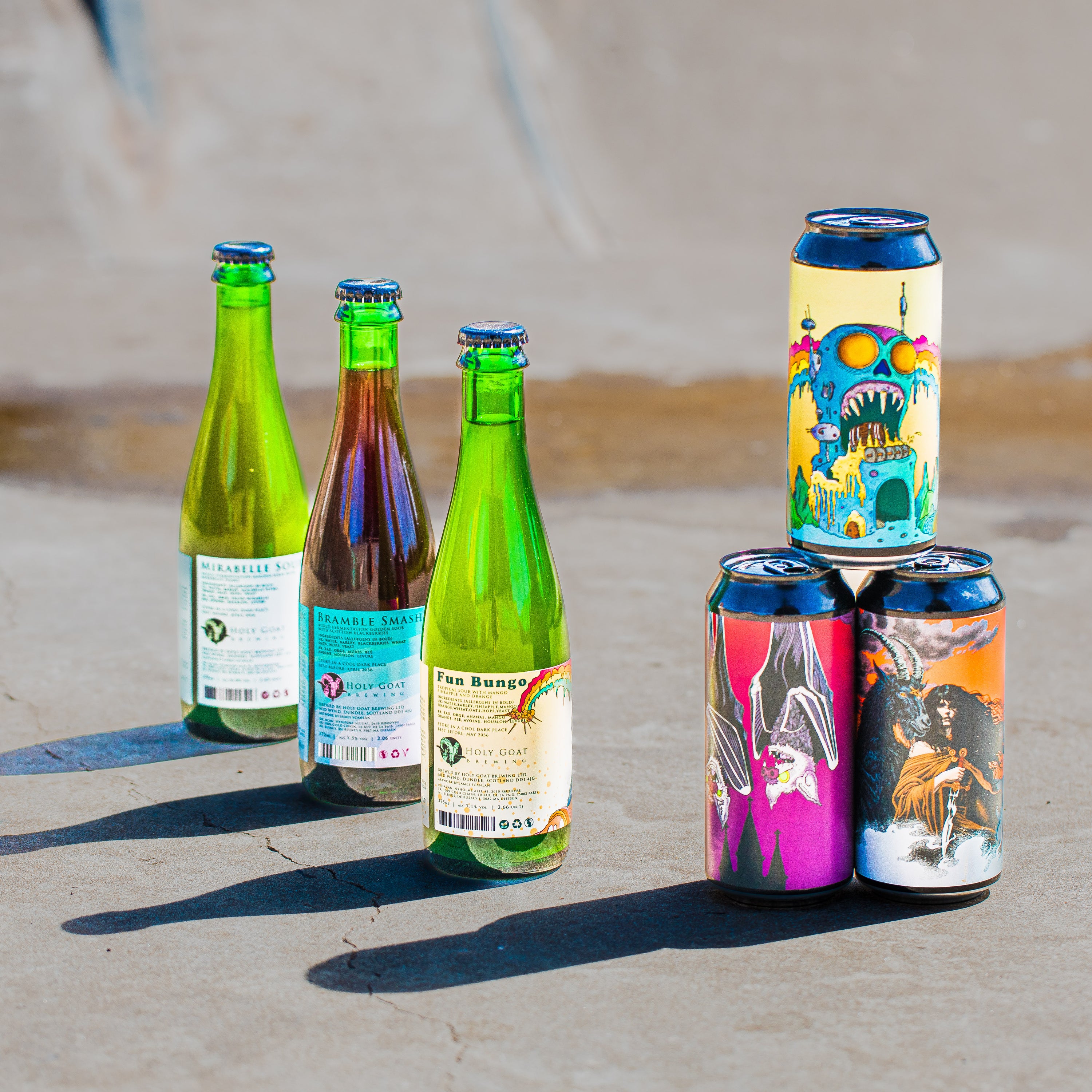 Holy Goat Brewing mixed bottles including Mirabelle Sour and Bramble Smash, with illustrated cans, Brewser subscription box
