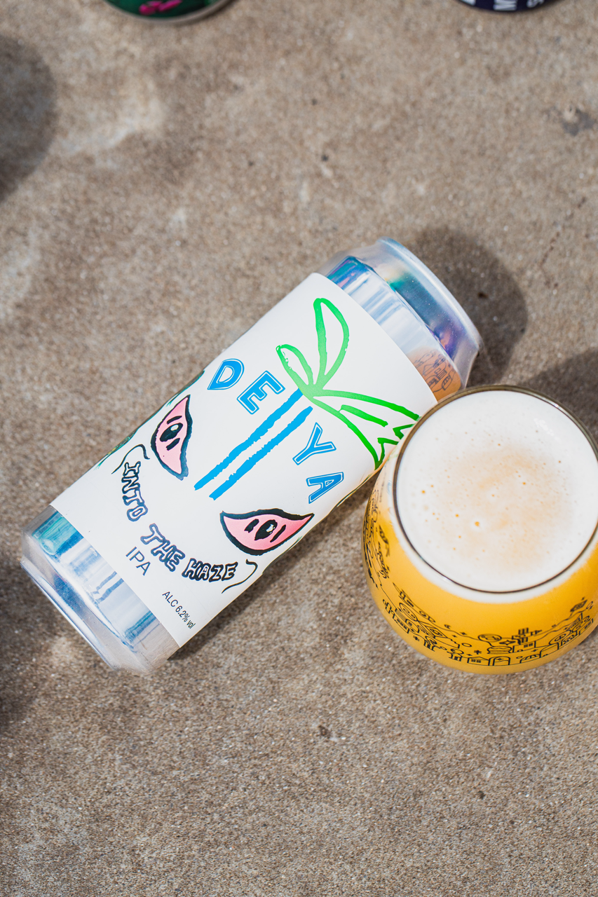 DEYA Into the Haze IPA can and poured glass on concrete, Brewser craft beer subscription
