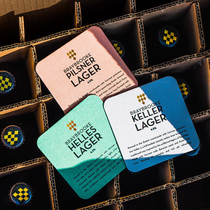 Braybrooke Pilsner, Helles and Keller Lager label cards on a Brewser subscription box tray, craft beer delivery